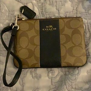 Brown and black coach purse/wristlet